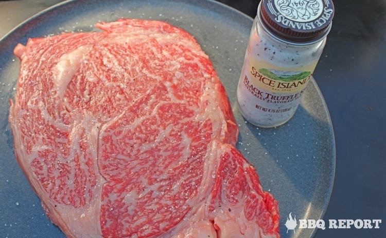 Seasoning the Wagyu with truffle salt Seasoning the Wagyu with truffle salt