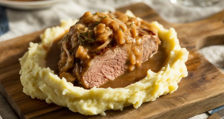 Tender Smothered Pork Steaks with Rich Onion Gravy